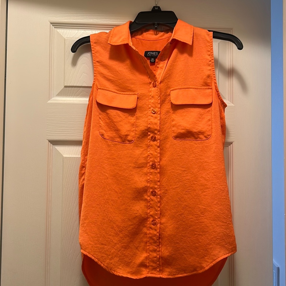 Orange sleeveless blouse